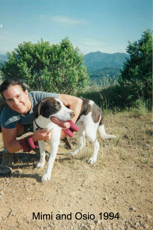 Mimi Gates with her dog in the mountains